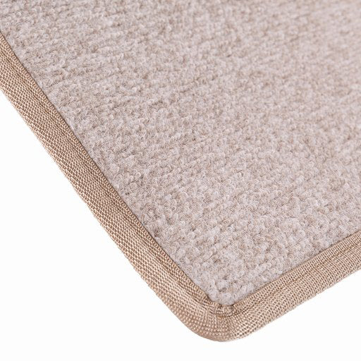 Beige ovimatto kantatuilla reunoilla.